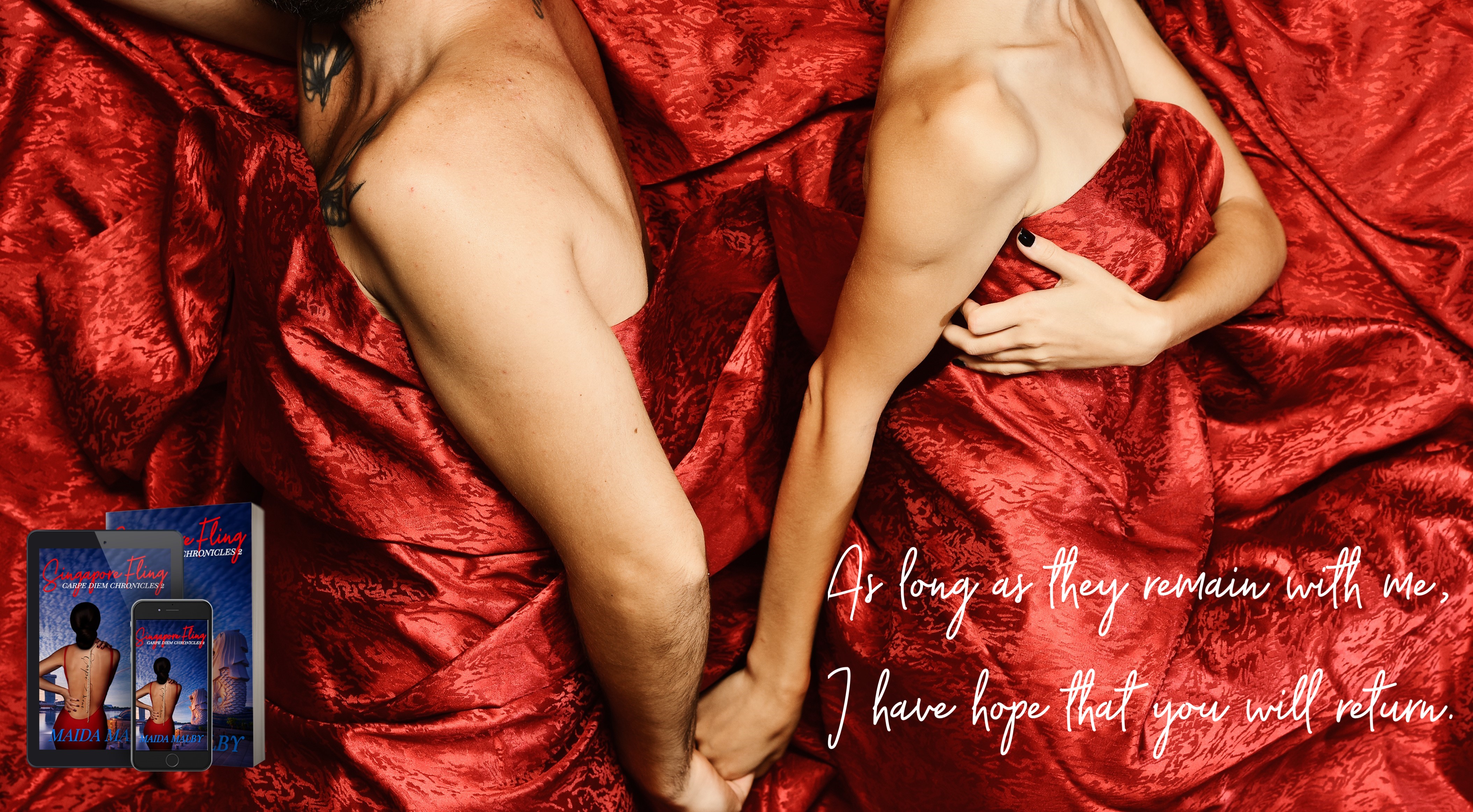 couple on a bed holding hands